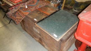 A late 19th century zinc lined wooden trunk with label inside lid 'W.J.Lovelace & Son.