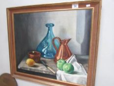 An oil on canvas still life study signed Maxie Stuart.