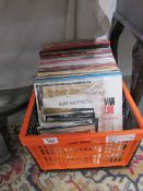 A box of 45 rpm and LP records.