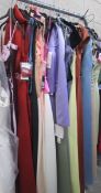 Approximately 20 assorted bridesmaid gowns in various sizes.