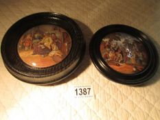 2 framed Victorian Pratt ware pot lids entitled 'Hide & Seek' and 'Village Wedding'