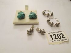 A pair of vintage natural turquoise earrings and 2 pairs of silver earrings (one hoop and one