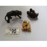 3 netsuke including a tiger,