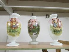A set of 3 19th century opaque glass hand painted vases.