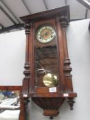 An Edwardian wall clock.