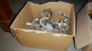 A box of chandelier parts