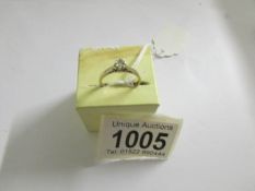 A yellow gold diamond solitaire ring, size K.