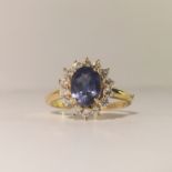 An oval sapphire dress ring, size N.