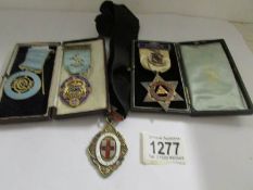 4 Masonic silver jewels.