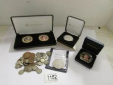 A mixed lot of coins including 2008 £5, a silver £5 coin,