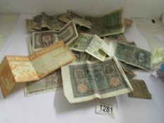 A quantity of foreign bank notes (in poor condition).