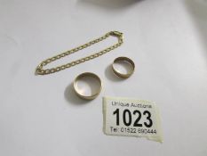 2 9ct gold wedding bands sizes Q and W together with a bracelet marked 9kt.