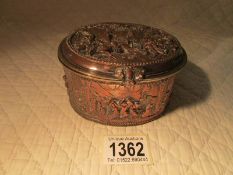 A 19th century embossed relief panel trinket box.