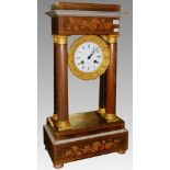 A French inlaid clock on stand.