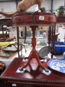 A mahogany drum table.