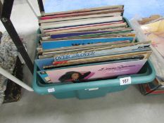 A box of records including Abba, Donna Summer etc.