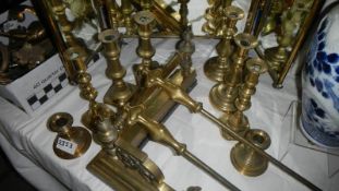 4 pairs of Victorian brass candlesticks.