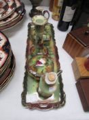 An Edwardian ceramic dressing table set.