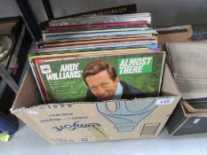 A box of LP records.