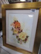 A framed and glazed watercolour of roses signed E Waters,.