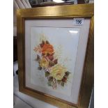 A framed and glazed watercolour of roses signed E Waters,.