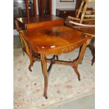 A mahogany inlaid table.