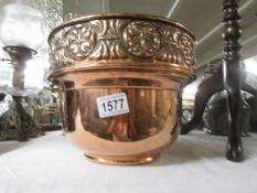 A polished copper arts and crafts jardiniere.