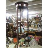 A mahogany inlaid pot stand.