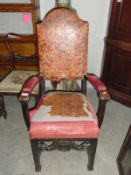 An oak framed armchair.