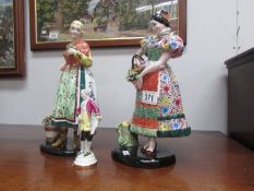 A pair of Italian figures and a Staffordshire porcelain figure,.
