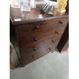 A mahogany 4 drawer chest.