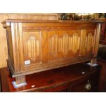 An oak panelled blanket box.