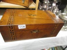 A mahogany inlaid writing box.
