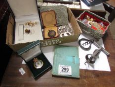 A mixed lot including jewellery, corkscrews, coins etc.