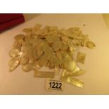 A large quantity of mother of pearl gaming counters,