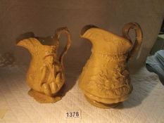 A 19th century Ridgways 'Baccanalia' jug dated October 1835 and another with embossed figures.