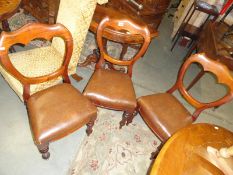 3 mahogany dining chairs.