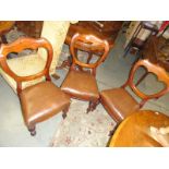 3 mahogany dining chairs.