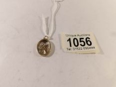 A 9ct gold St, Christopher pendant, 5 grams.