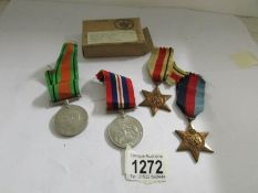 4 WW2 medals with original box and certificate (not dedicated).