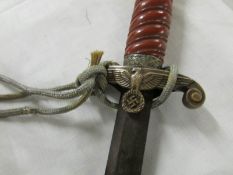 A Nazi Heer dagger (without scabbard) and a Portapee.