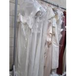Approximatley 29 assorted wedding dresses/gowns in various sizes.