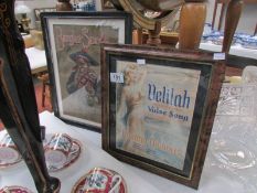2 framed and glazed advertisements.