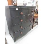 A 2 over 3 bow front chest of drawers.