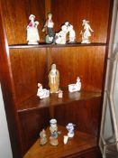 A mixed lot of figures including oriental.