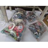 4 bags of costume jewellery.