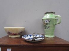 An Arthur Wood 'Astoria' jug, an art pottery bowl and a blue and white dish with plated handle.