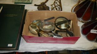 A tray of magnifying glasses.