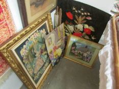 A quantity of tapestries, some framed and glazed.