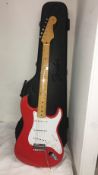 A 1997 Fender Stratocaster Hank Marvin guitar, Fiesta Red, American pick ups, factory installed,